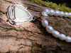 Seaglass and seaweed Pendant on white pearls