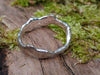 Sterling silver chunky ring with a molten texture, unisex design