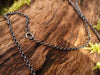 Antiqued silver and Moss Agate necklace stylised fish. Close up of chain catch