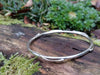 Thick sterling silver wound bangle